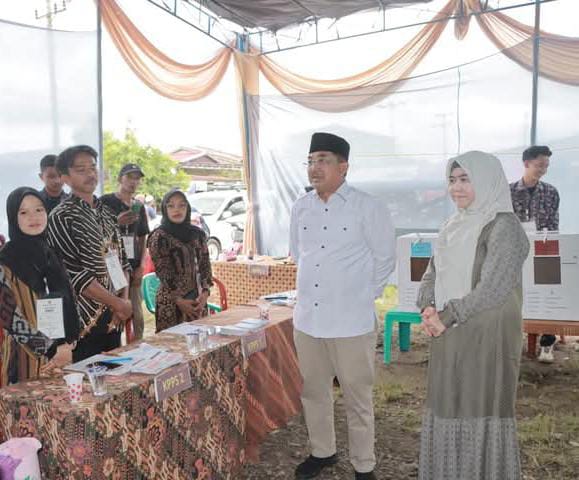 Bupati Tanjabbar Tinjau Langsung Pelaksanaan Pilkada 2024, Pastikan Proses Berjalan Lancar dan Kondusif